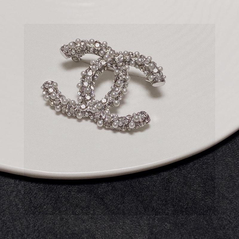 Ch**el brooches